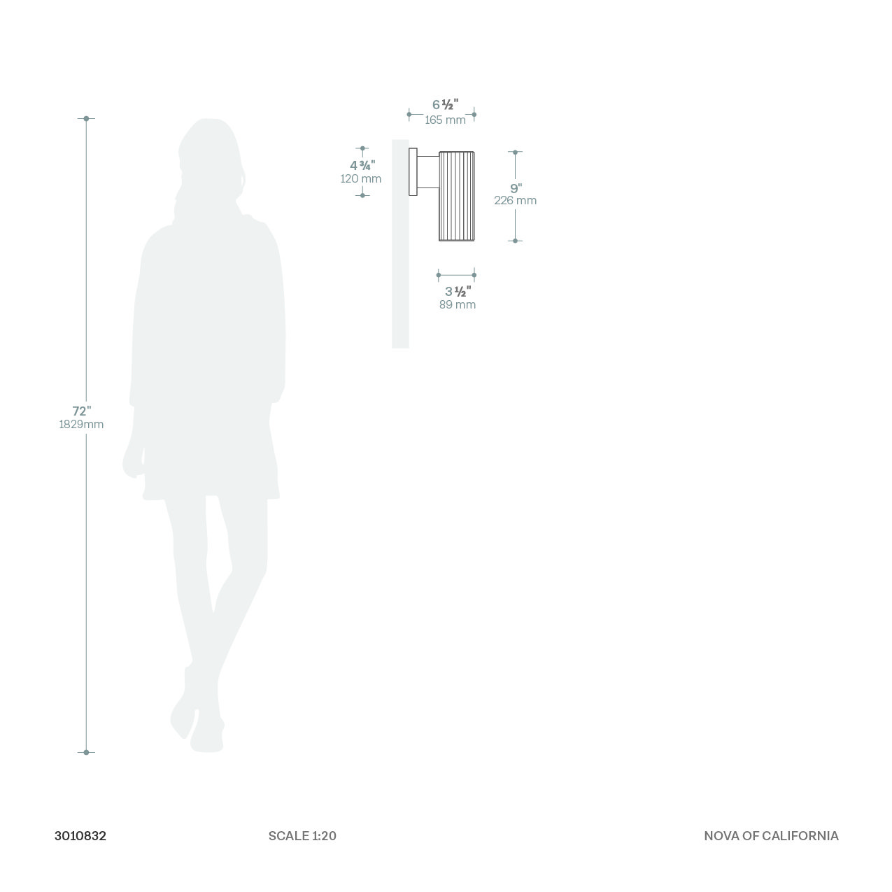 Tambo Wall Sconce in Ash and Brass with Warm Ambient Glow